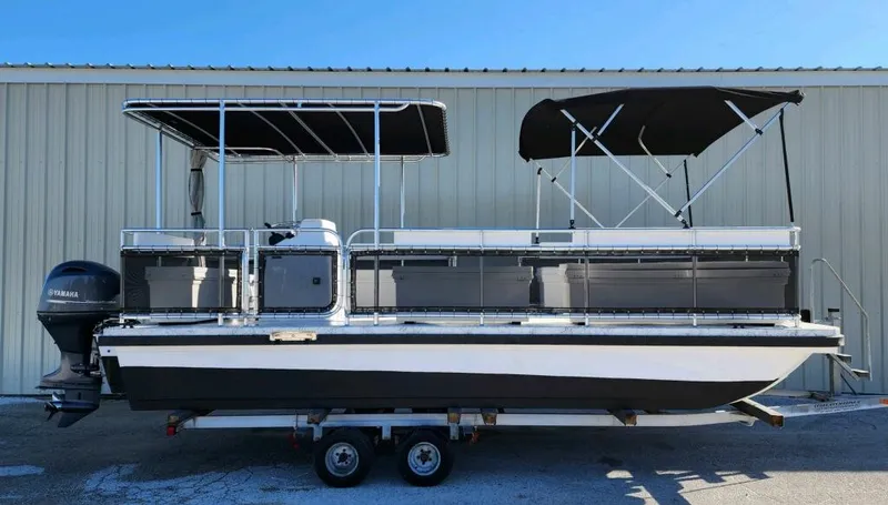 The Image of 2025 A&M Manufacturing Salty 23 pontoon boat on trailer, side view. - 0