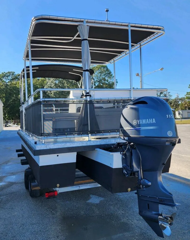 Slide: The Image of 2025 A&M Manufacturing Salty 23 boat with Yamaha 115 outboard motor. - 11