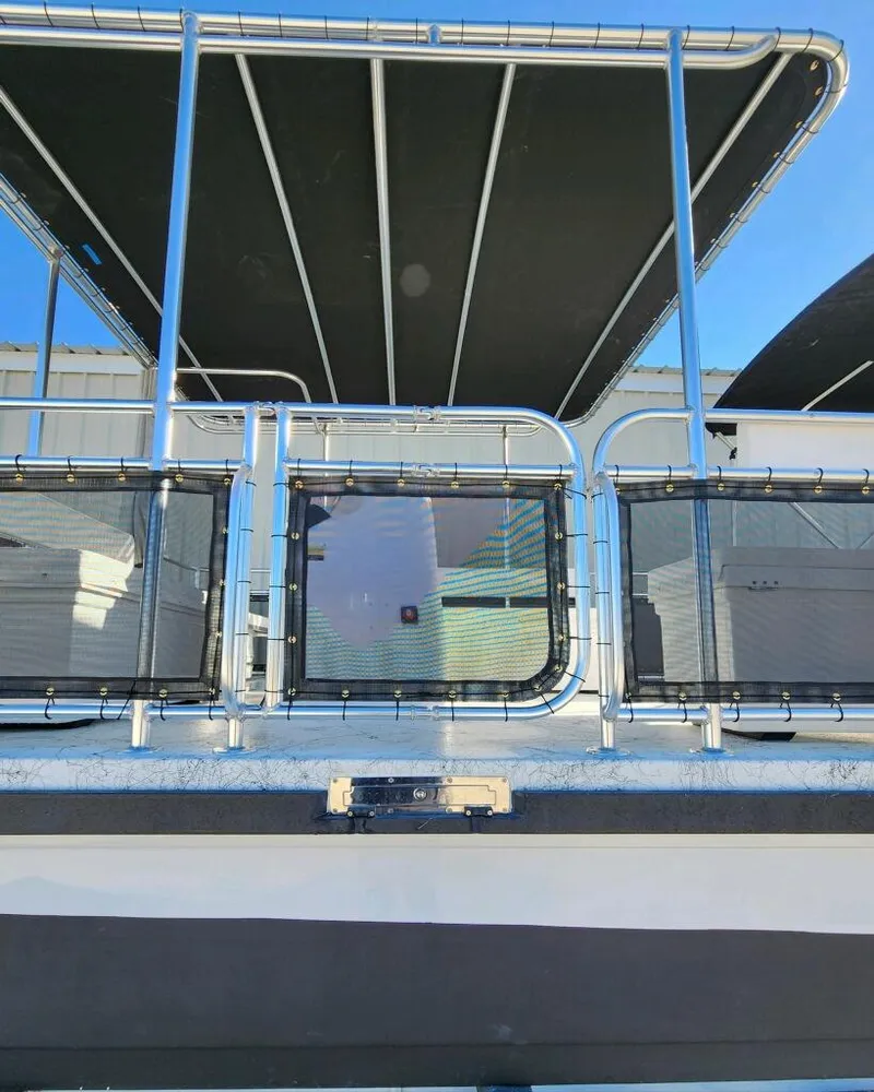 Slide: The Image of 2025 A&M Manufacturing Salty 23 boat with sleek design and modern features. - 4