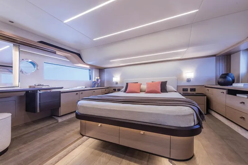 Slide: The Image of Luxurious bedroom interior of 2025 Absolute 53 Navetta yacht with modern design and ambient lighting. - 11