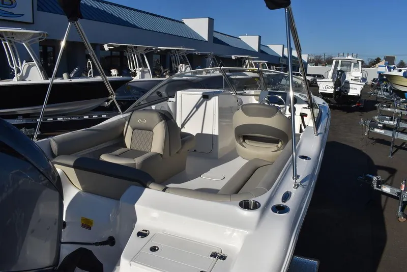 Slide: The Image of 2025 Key West 203 DFS boat with spacious seating and modern design. - 14