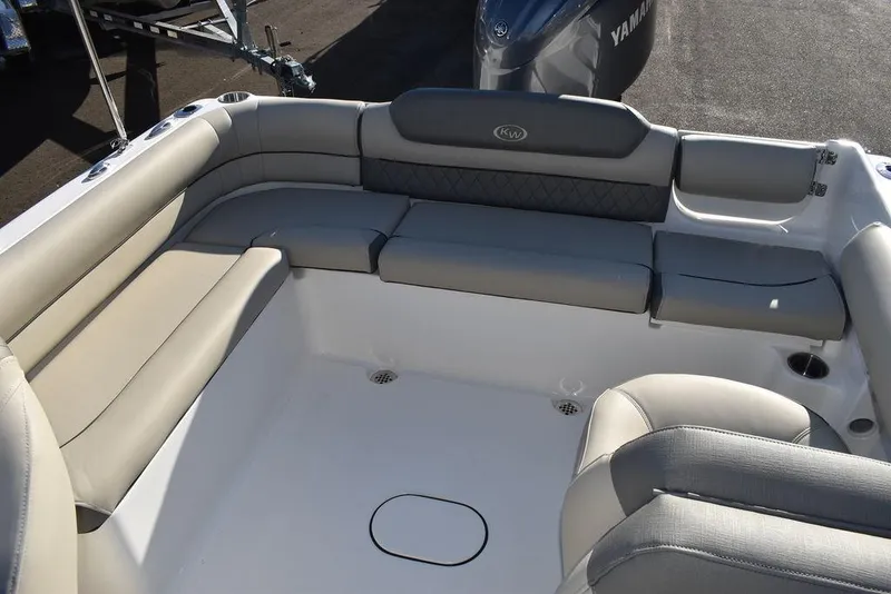 Slide: The Image of 2025 Key West 203 DFS boat interior with cushioned seating and modern design. - 22