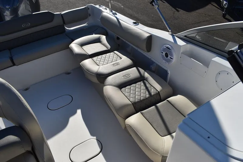 Slide: The Image of 2025 Key West 203 DFS boat interior with cushioned seating and modern design. - 28