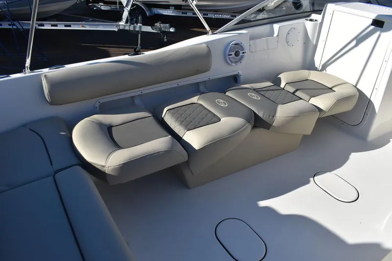 Slide: The Image of 2025 Key West 203 DFS boat interior with cushioned seating and modern design. - 29