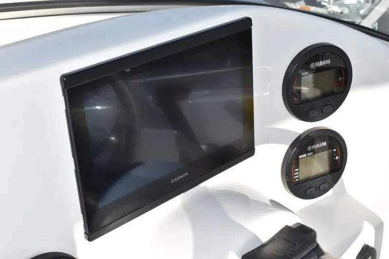 Slide: The Image of Dashboard of 2025 Key West 203 DFS boat with Garmin display and Yamaha gauges. - 33