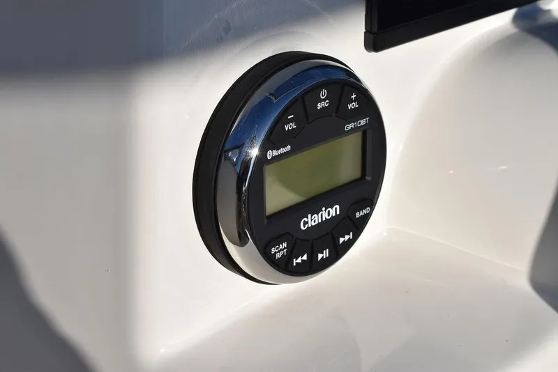 Slide: The Image of Clarion Bluetooth stereo system on 2025 Key West 203 DFS boat dashboard. - 34