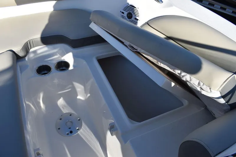 Slide: The Image of 2025 Key West 203 DFS boat interior with seating and cup holders. - 44