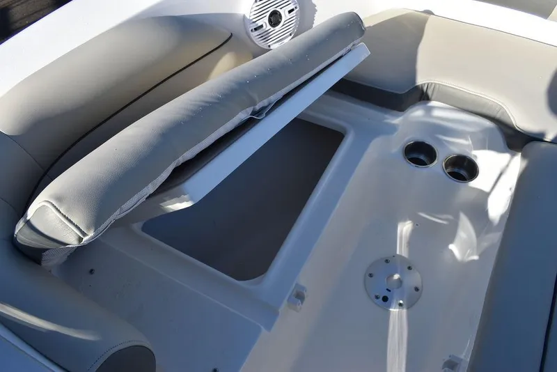 Slide: The Image of Key West 203 DFS 2025 boat interior with seating and cup holders. - 45