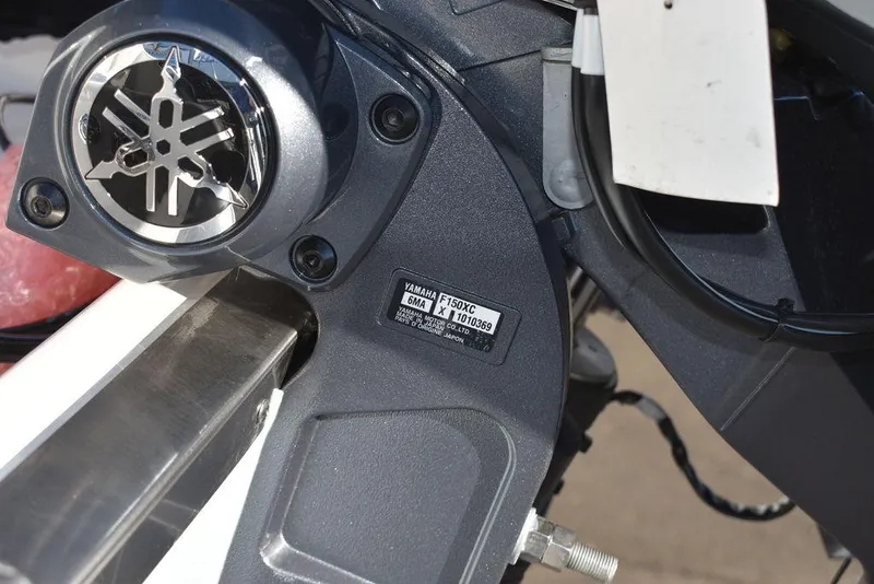 Slide: The Image of Close-up of a 2025 Key West 203 DFS boat engine component. - 49