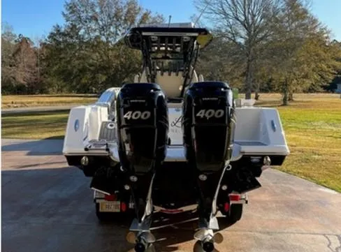 Slide: The Image of 2022 Tidewater 320 CC Adventure boat with dual 400 horsepower engines. - 3