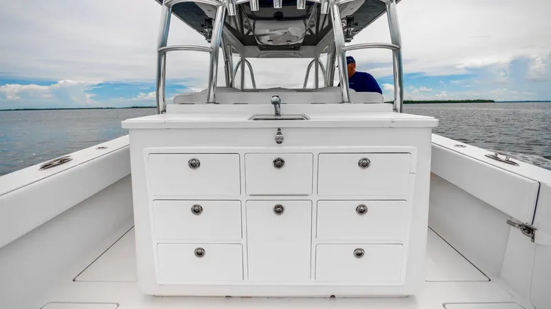 Slide: The Image of 2017 SeaHunter 45 Tournament boat with storage drawers on deck, ocean view. - 14