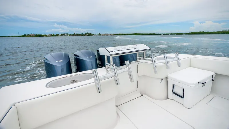 Slide: The Image of 2017 SeaHunter 45 Tournament boat with triple engines on open water. - 15