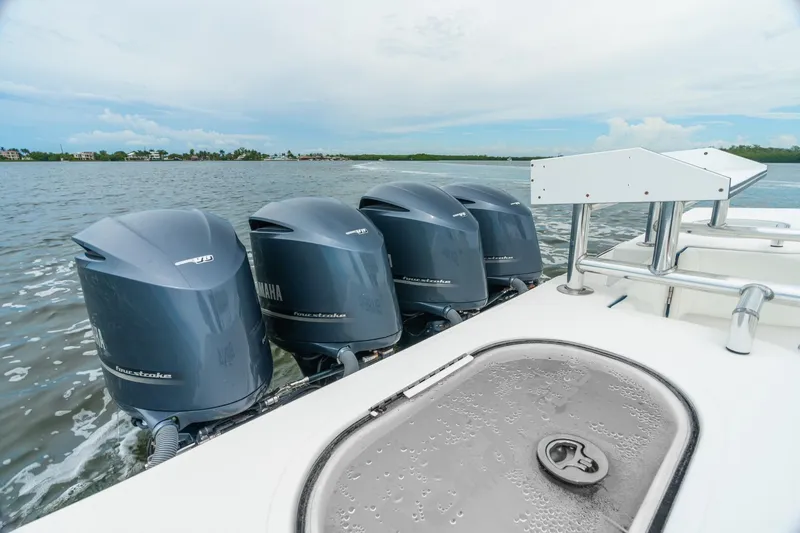 Slide: The Image of 2017 SeaHunter 45 Tournament boat with four Yamaha outboard engines on the water. - 16