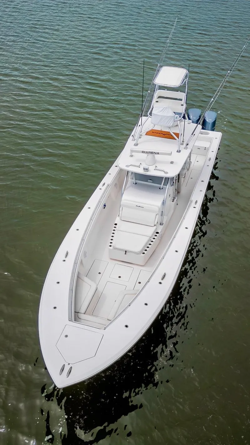 Slide: The Image of 2017 SeaHunter 45 Tournament boat on calm water, aerial view. - 5