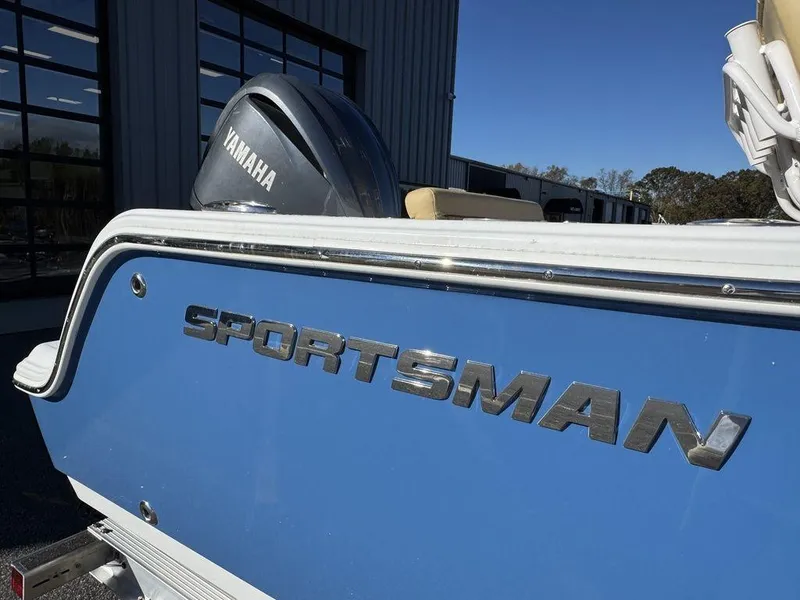 Slide: The Image of 2025 Sportsman Open 212 boat with Yamaha engine, blue exterior. - 8