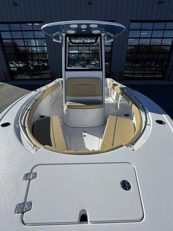Slide: The Image of 2025 Sportsman Open 212 boat with spacious seating and modern design. - 9