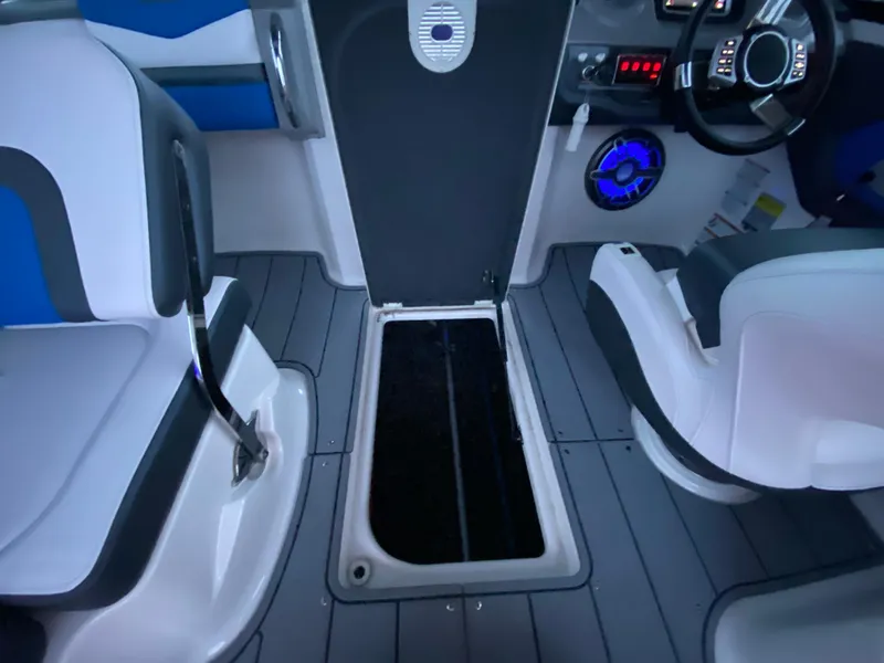 Slide: The Image of 2020 Chaparral 223 Vortex VRX interior with modern seating and dashboard design. - 16