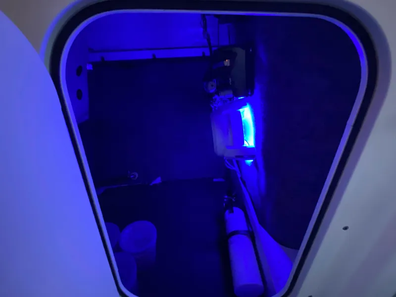 Slide: The Image of 2020 Chaparral 223 Vortex VRX interior with blue ambient lighting. - 23
