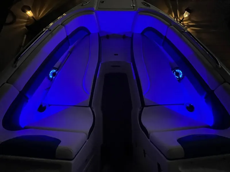 Slide: The Image of 2020 Chaparral 223 Vortex VRX boat interior with blue LED lighting. - 27