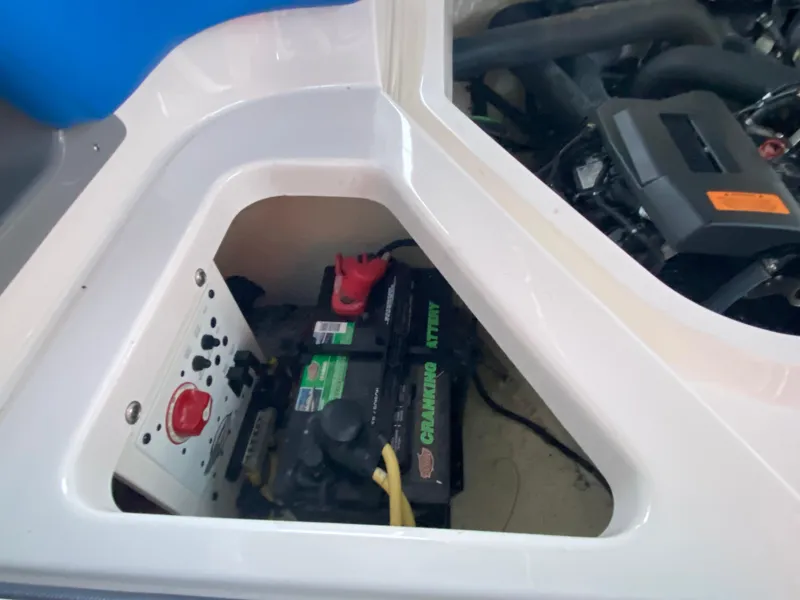 Slide: The Image of 2020 Chaparral 223 Vortex VRX boat battery compartment and engine view. - 42