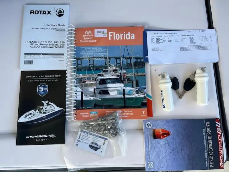 Slide: The Image of Boat manuals and accessories for 2020 Chaparral 223 Vortex VRX, including Florida cruising guide. - 44