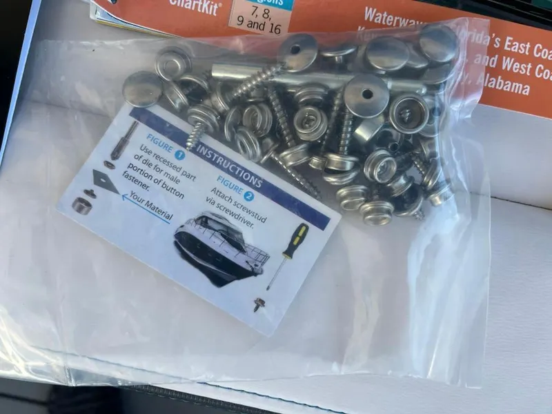 Slide: The Image of Bag of screws and instructions for 2020 Chaparral 223 Vortex VRX boat assembly. - 45