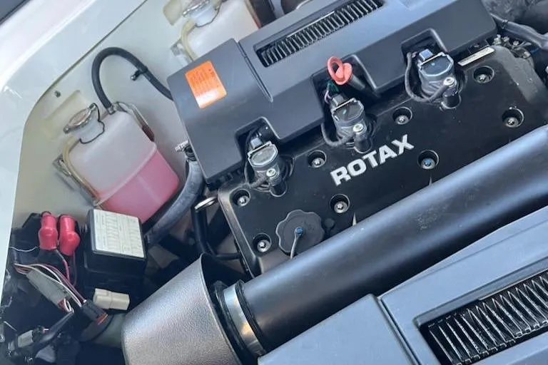 Slide: The Image of Engine compartment of a 2020 Chaparral 223 Vortex VRX with Rotax engine components. - 50