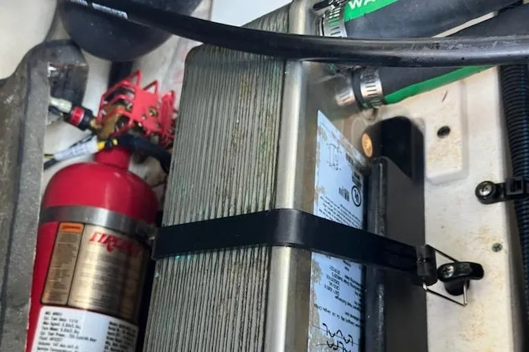 Slide: The Image of Engine compartment of 2020 Chaparral 223 Vortex VRX with fire extinguisher. - 51