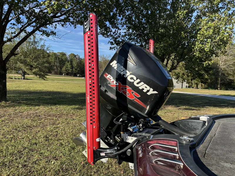 Slide: The Image of 2009 Ranger Z520 Comanche with Mercury Pro XS engine in a scenic outdoor setting. - 7
