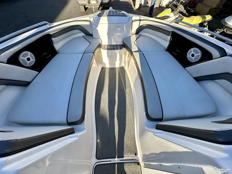 Slide: The Image of 2019 Yamaha AR240 boat interior with spacious seating and built-in speakers. - 4