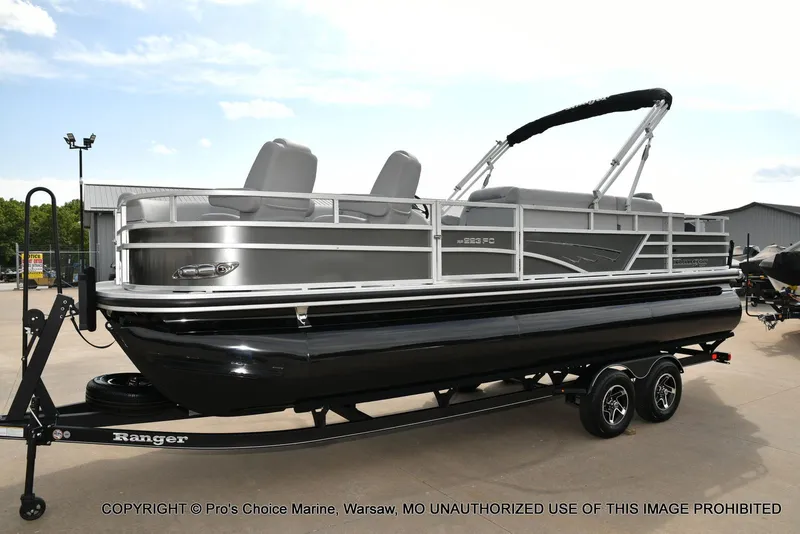 Slide: The Image of 2025 Ranger 223FC pontoon boat with 200HP Mercury 4 Stroke engine on trailer. - 18