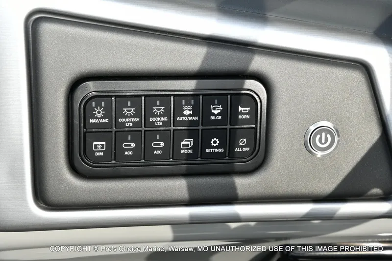 Slide: The Image of Control panel of 2025 Ranger 223FC boat with various function buttons. - 38