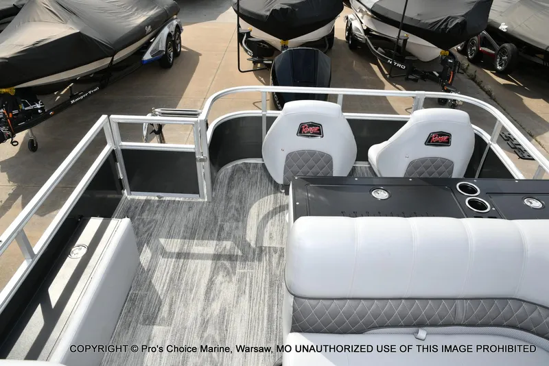 Slide: The Image of 2025 Ranger 223FC boat interior with seating and console, featuring 200HP Mercury 4 Stroke engine. - 42
