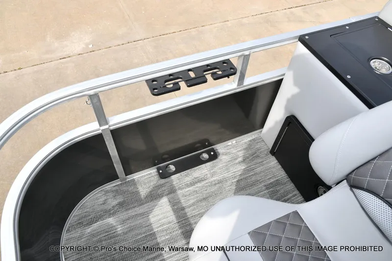 Slide: The Image of Interior view of 2025 Ranger 223FC boat with seating and railing details. - 46