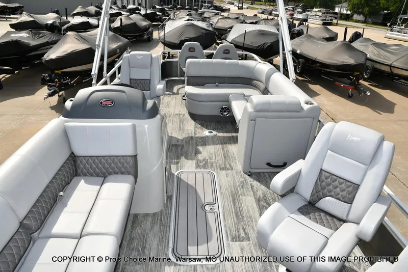Slide: The Image of 2025 Ranger 223FC pontoon boat with luxurious seating and modern design. - 8