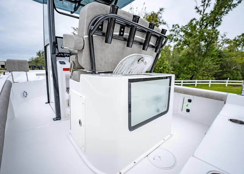 Slide: The Image of 2025 Sea Hunt BX 25 FS boat interior with seating and storage compartments. - 10