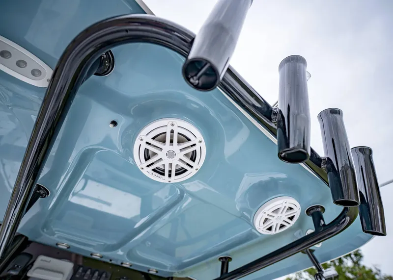 Slide: The Image of 2025 Sea Hunt BX 25 FS boat with speakers and rod holders. - 14