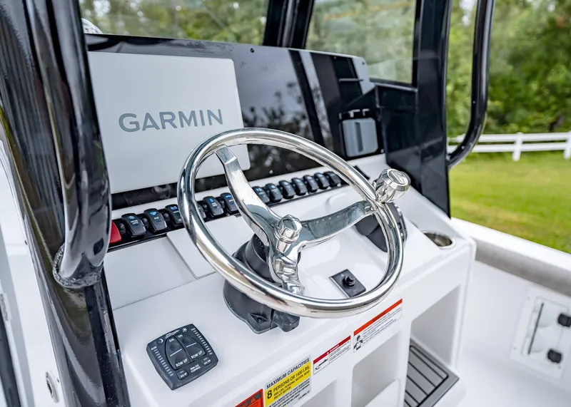 Slide: The Image of 2025 Sea Hunt BX 25 FS boat helm with Garmin navigation system. - 19