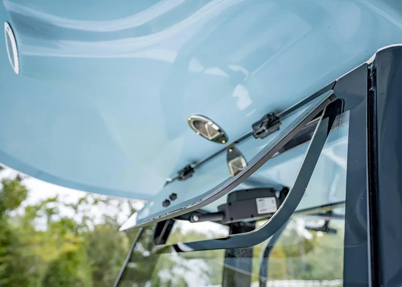 Slide: The Image of Close-up of 2025 Sea Hunt BX 25 FS boat windshield and canopy. - 25