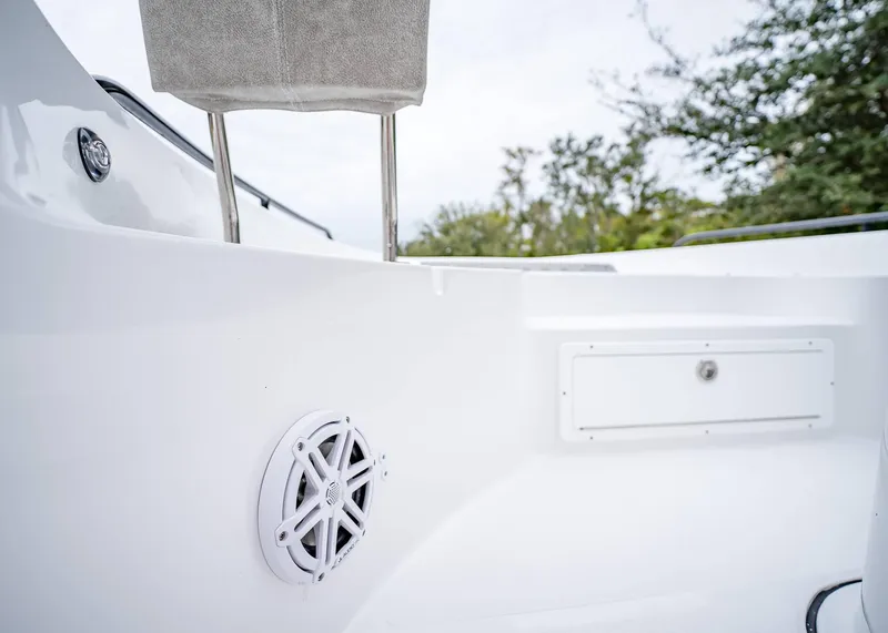 Slide: The Image of 2025 Sea Hunt BX 25 FS boat interior with speaker and storage compartment. - 27