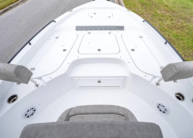 Slide: The Image of 2025 Sea Hunt BX 25 FS boat deck with storage compartments and seating. - 32