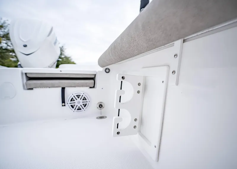 Slide: The Image of Interior view of 2025 Sea Hunt BX 25 FS boat, featuring seating and speaker. - 33