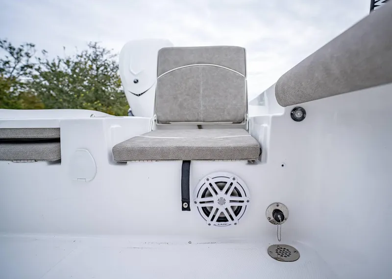 Slide: The Image of 2025 Sea Hunt BX 25 FS boat interior with seating and speaker system. - 8