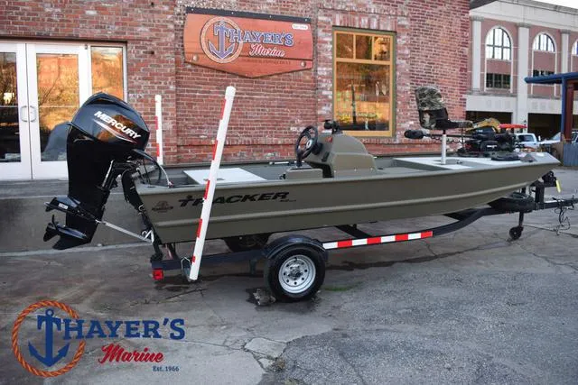 Slide: The Image of 2023 Tracker GRIZZLY® 1648 SC boat on trailer at Thayer's Marine. - 3