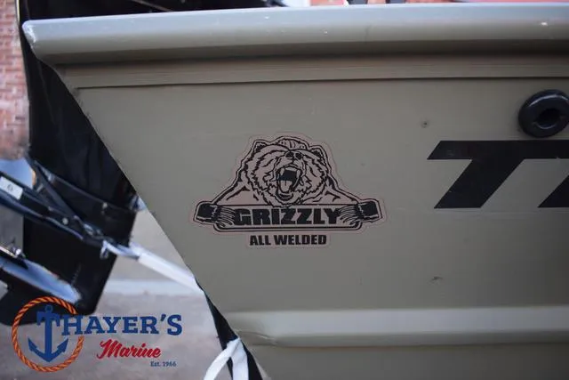 Slide: The Image of 2023 Tracker GRIZZLY® 1648 SC boat with "All Welded" logo at Thayer's Marine. - 4
