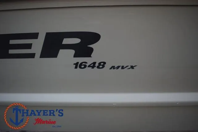 Slide: The Image of 2023 Tracker GRIZZLY® 1648 SC boat with Thayer's Marine logo. - 5
