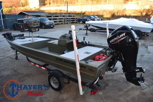 Slide: The Image of 2023 Tracker GRIZZLY® 1648 SC boat with Mercury engine on trailer at Thayer's Marine. - 9