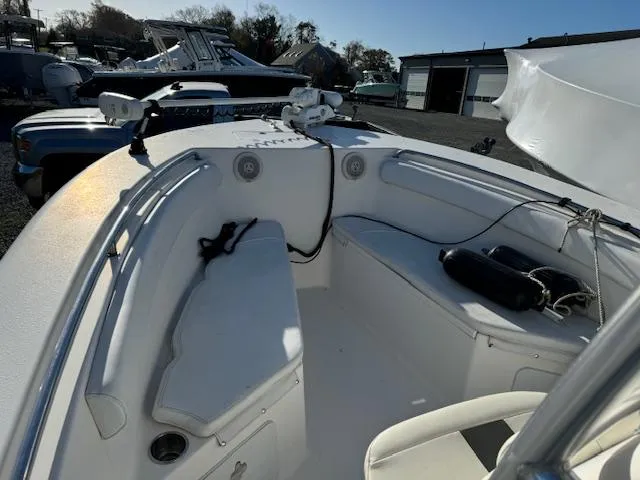 Slide: The Image of 2013 Tidewater 230 CC Adventure boat interior with seating and equipment. - 6
