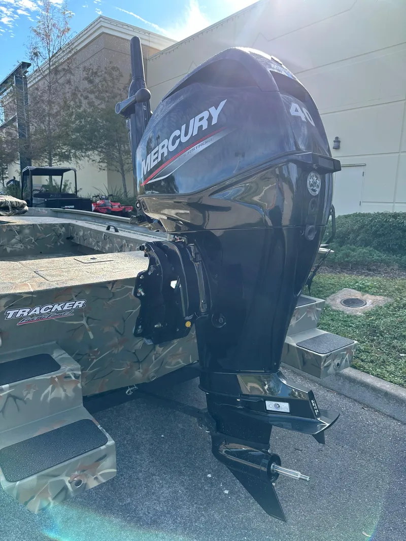 Slide: The Image of 2025 Tracker Grizzly 1654 T Sportsman boat with Mercury 40HP outboard motor. - 4