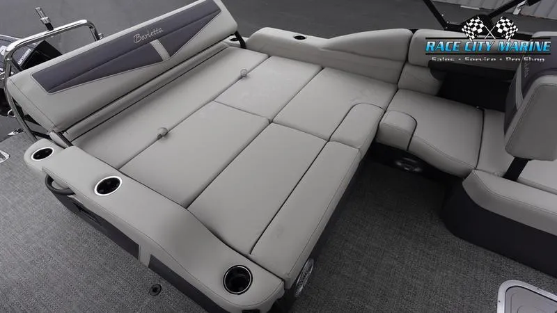 Slide: The Image of 2025 Barletta C22U boat interior with spacious seating and cup holders. - 17